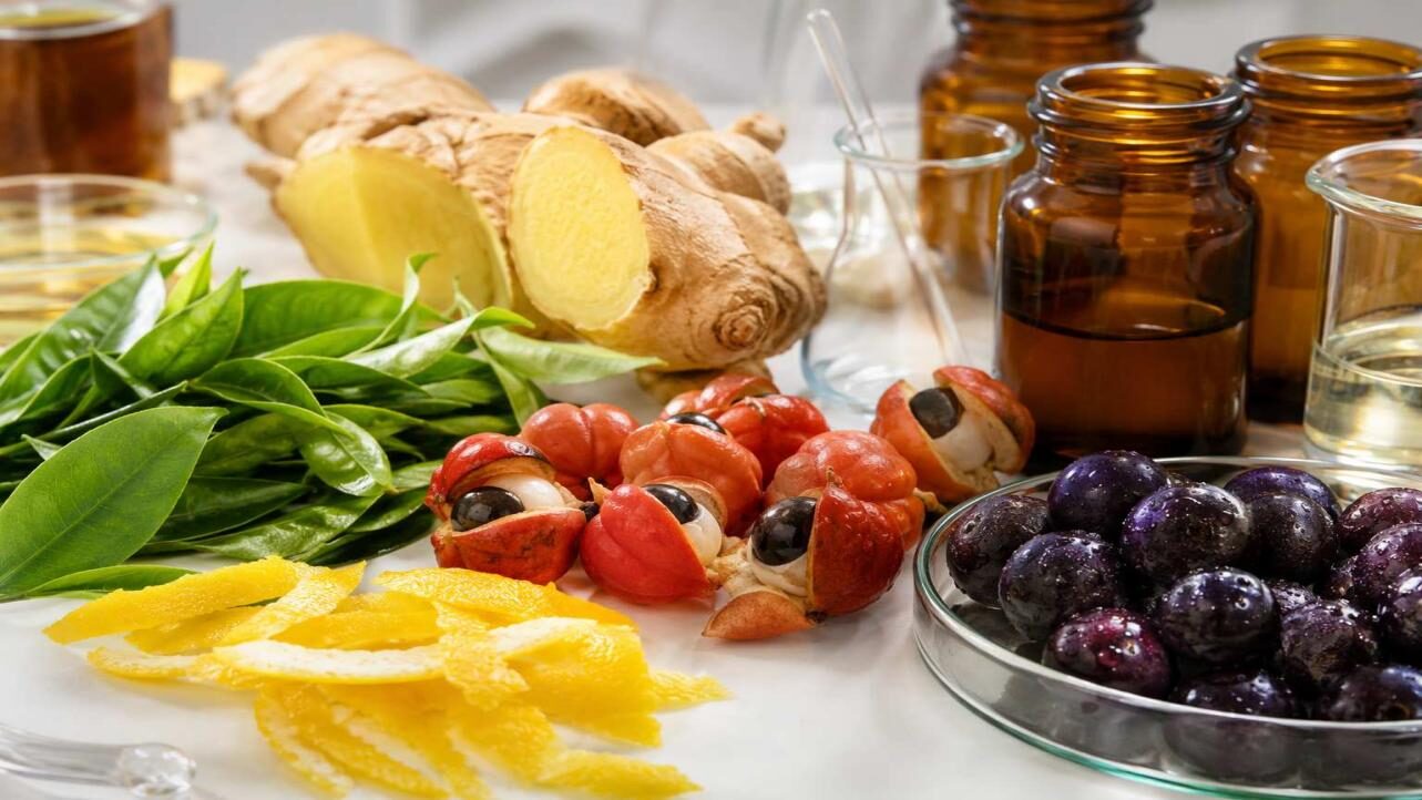 Key natural flavor source ingredients for better-for-you energy drink formulation — green tea, guarana, citrus, ginger and botanicals — explored through a food science lens.